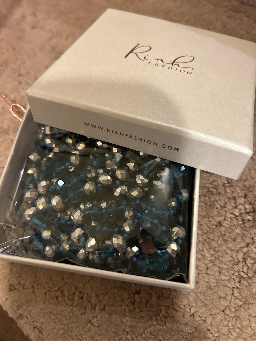 Double knotted bead stran